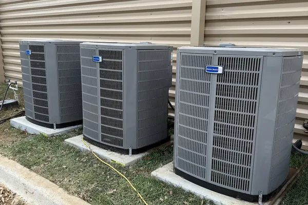 Three condensing units installed side by side