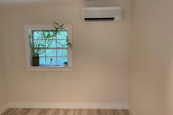 A ductless indoor head mounted in a finished room