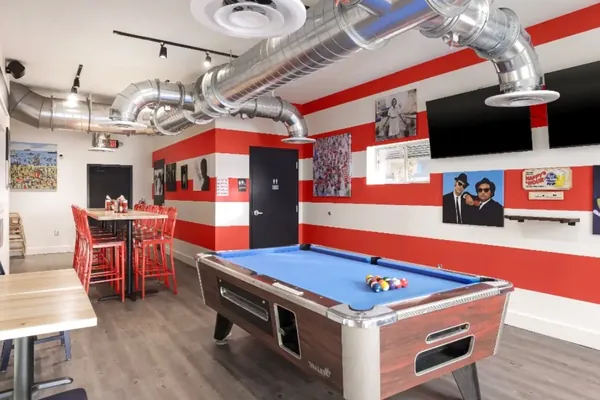 Spiral ductwork above a restaurant game room