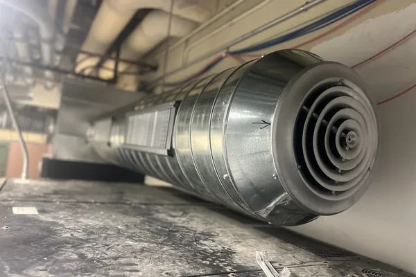 Close view of a spiral duct terminal fitting