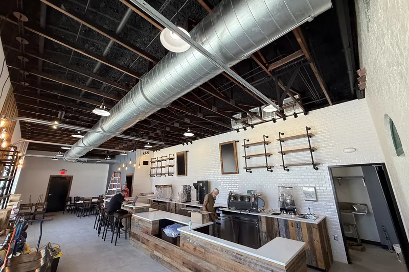 Commercial HVAC work by Climatech of Professional Air &mdash; spiral ductwork above a cafe build-out