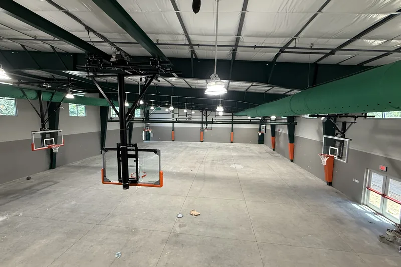 Commercial HVAC work by Climatech of Professional Air &mdash; fabric duct running the length of an indoor basketball court