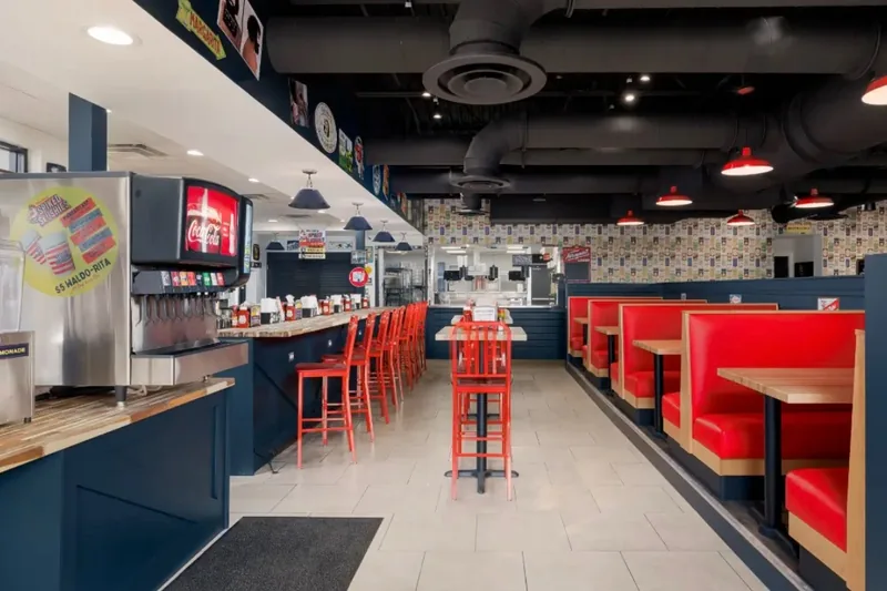 Commercial HVAC work by Climatech of Professional Air &mdash; exposed ductwork above the dining room of a finished restaurant
