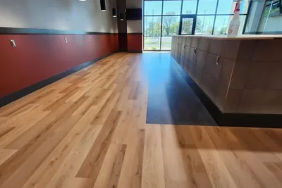 Commercial HVAC work by Climatech of Professional Air &mdash; ductwork and pendant lighting in a finished restaurant dining room