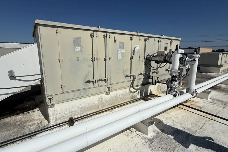 Commercial HVAC work by Climatech of Professional Air &mdash; a rooftop air handler with insulated piping