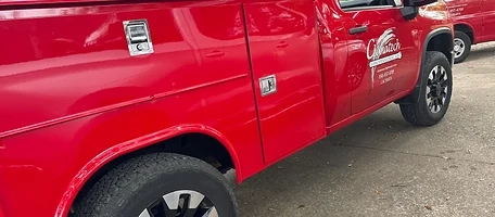 Red Climatech of Professional Air service truck parked on a driveway